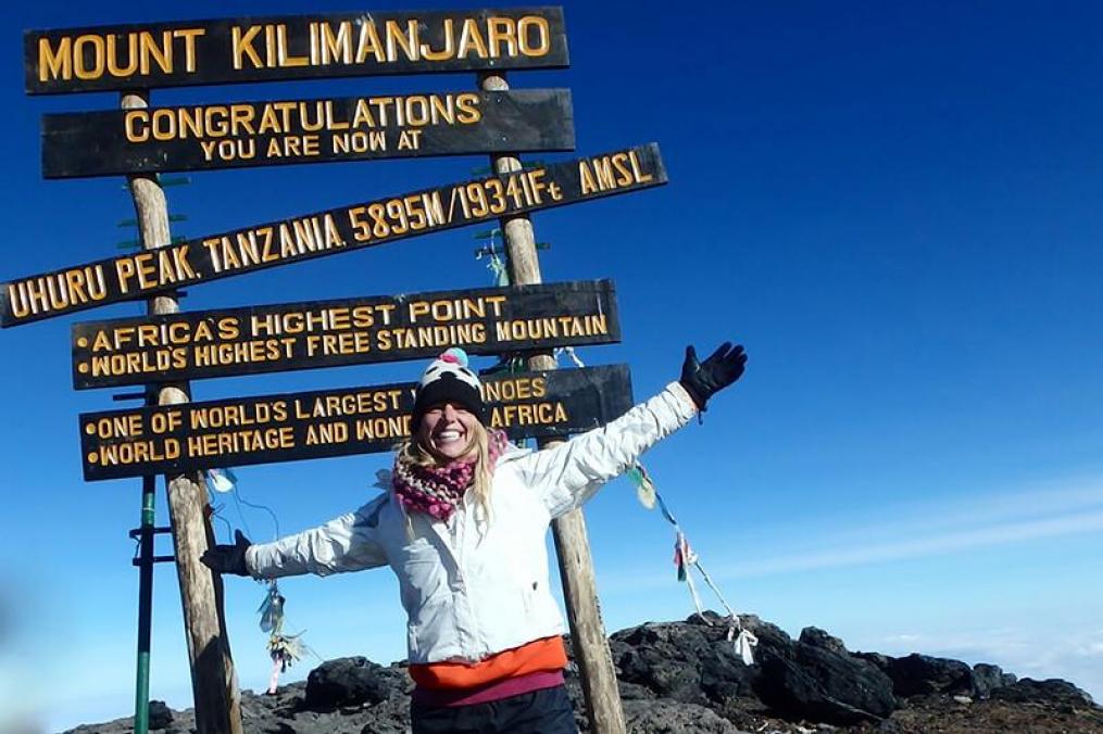 A Keuka College student atop Mount Kilimanjaro