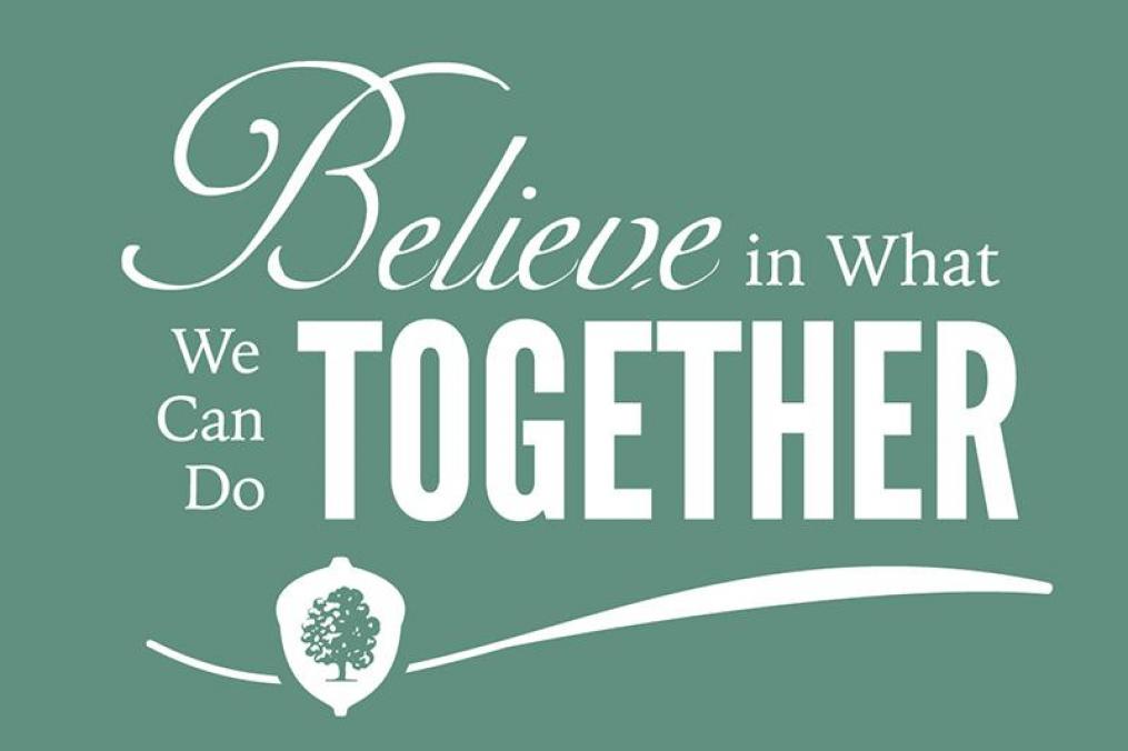 Keuka acorn logo with tree in the center and "Believe in What We Can Do Together" in text above it
