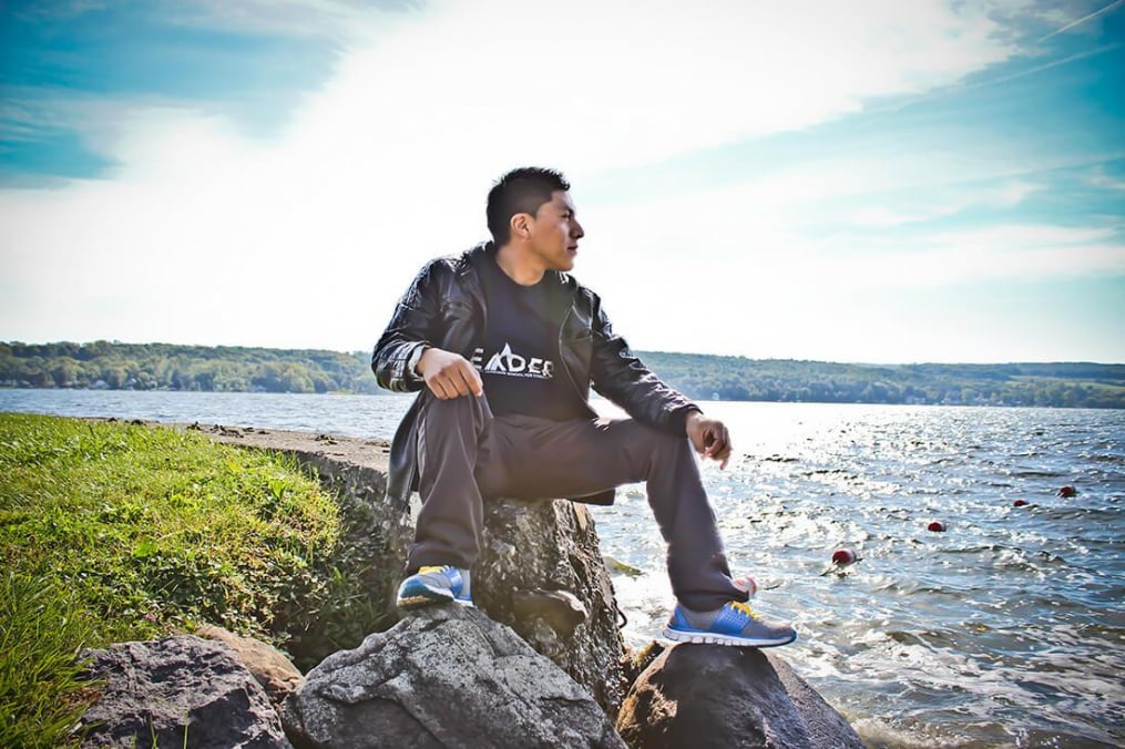 Erik Yax Sits on a Rock