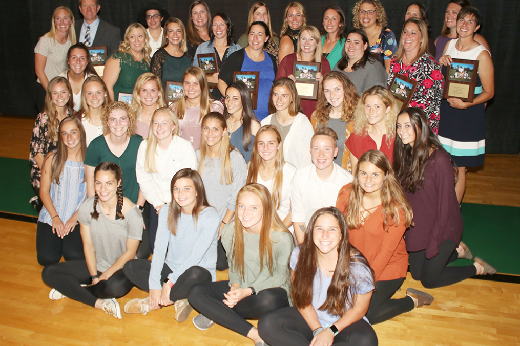 The newly inducted 2001 Women's Soccer team poses with members of the current Women's Soccer team at the Dr. Arthur F. Kirk, Jr. Athletics Hall of Fame Induction &amp; Dinner Friday night. 