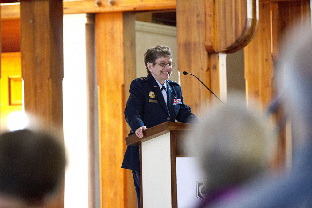 Maj. Gen. Lorraine K. Potter speaking at a podium in Norton Chapel
