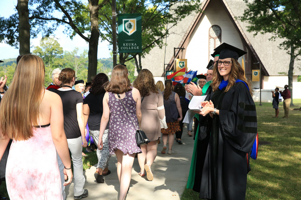  Dr. Janine Bower greeting students outside of Norton Chapel