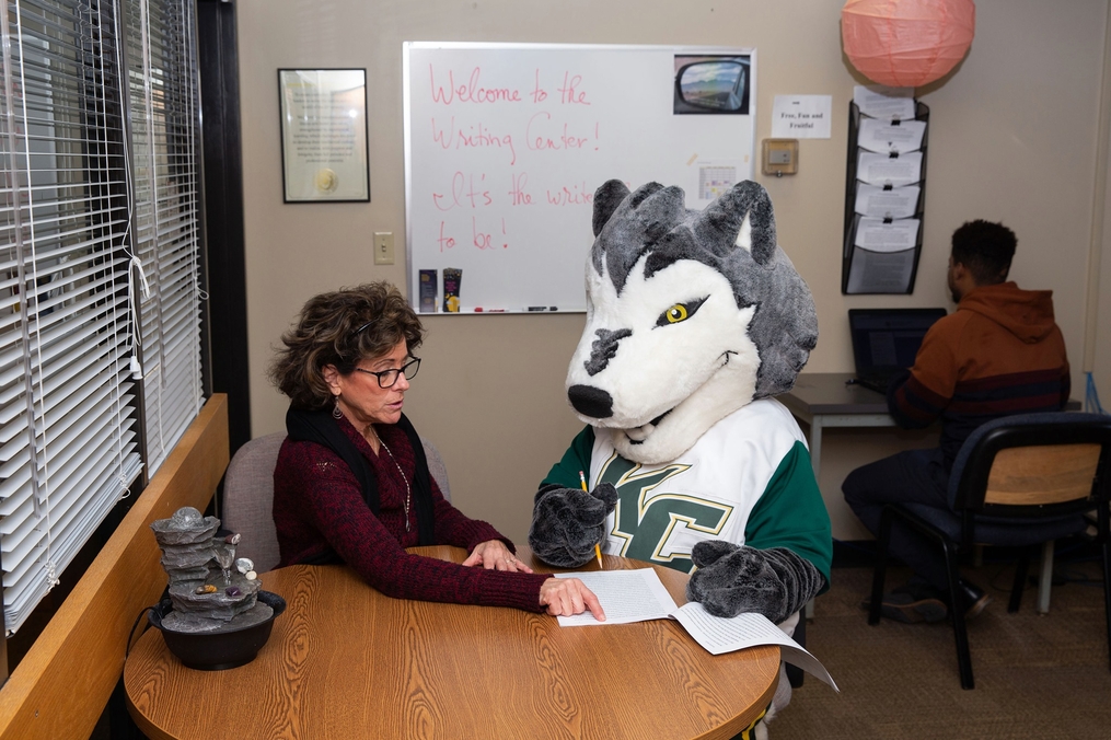 Kacey the Wolf gets writing advice from the Writing Center
