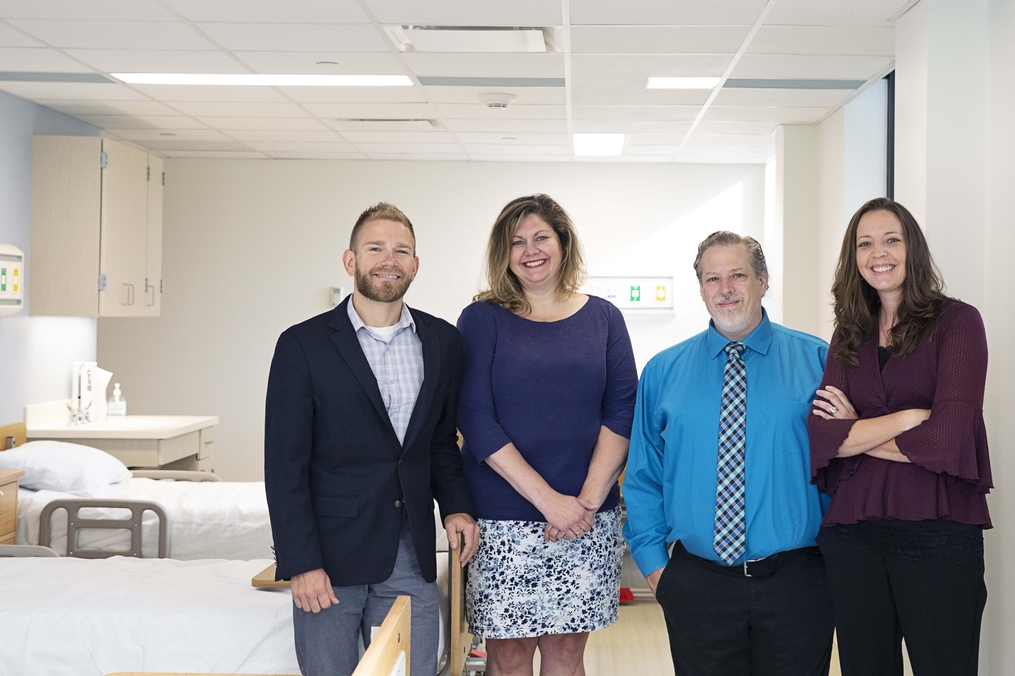 Dr. Jason McKinney, Dr. Beth Russo, Dr. Chris Alterio and Dr. Kristen Bacon pictured in new Center for Health Innovation in Harrington Hall  