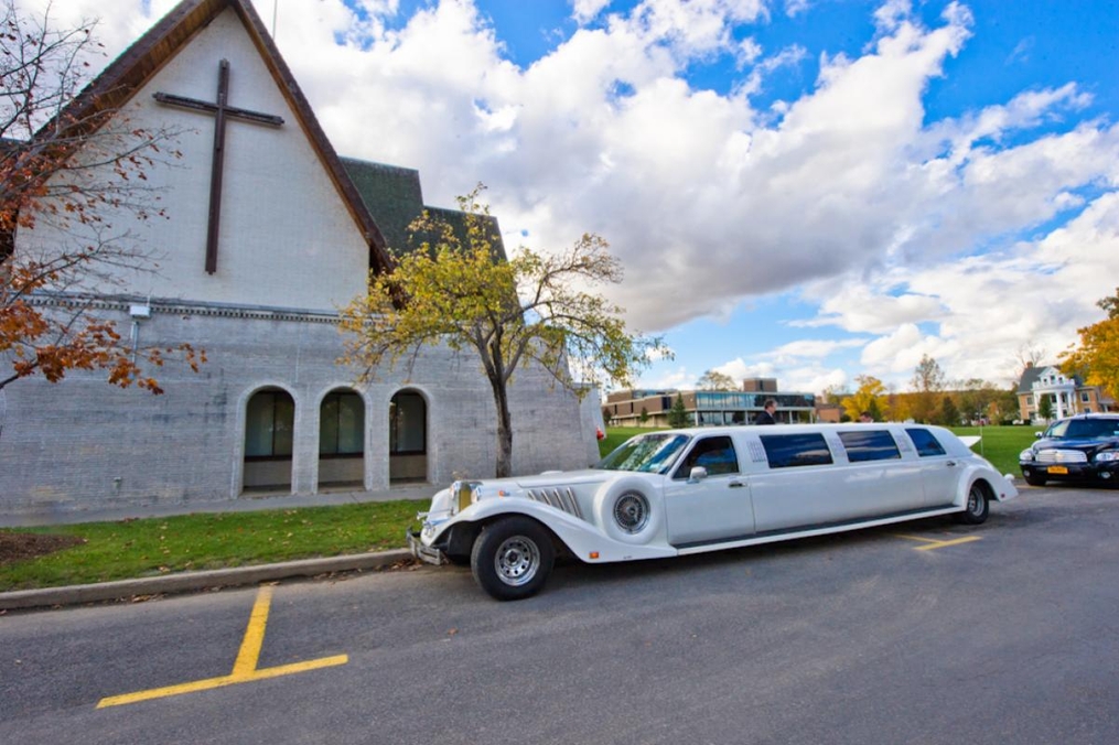 view of a limo outside of the chapel