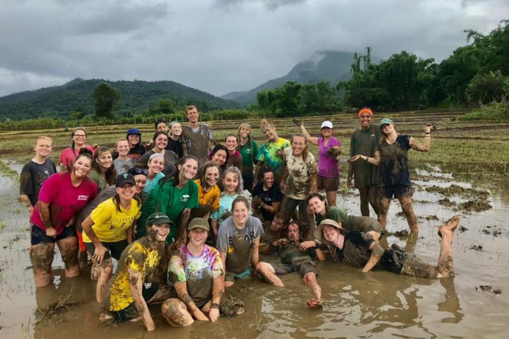 Sarah Honan '21 completed a summer Field Period® in Thailand. Here, she poses with members of her Growth International Volunteer Excursions crew. "Nothing compares to being barefoot, knee deep in a muddy rice paddy!" 