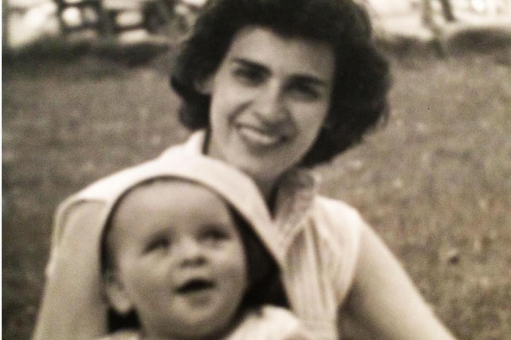 Katherine "Katie" Panarites Brown when she was young with her baby on her lap
