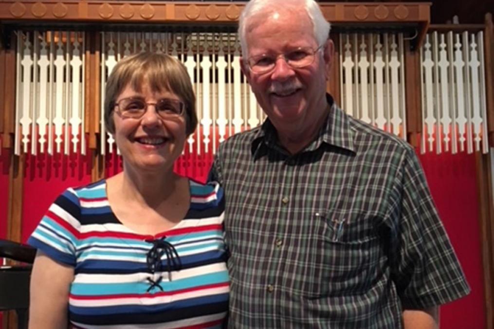 Mary Beth Mankin ’standing next to her husband, Bill Mankin in the chapel