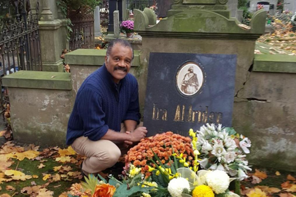Ira Aldridge's grave in Łódź, Poland. Visiting the grave is American actor Ted Lange, perhaps best known for his role as Isaac Washington on the TV series "The Love Boat." Lange always wanted to be a Shakespearean actor.