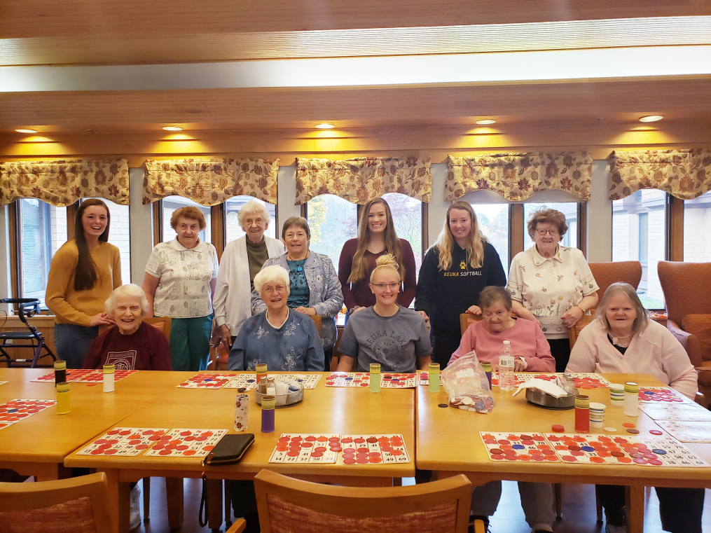 These Keuka College students, visiting residents at Clinton Crest Manor, were among the 44 members of the College community participating in Make a Difference Day. 