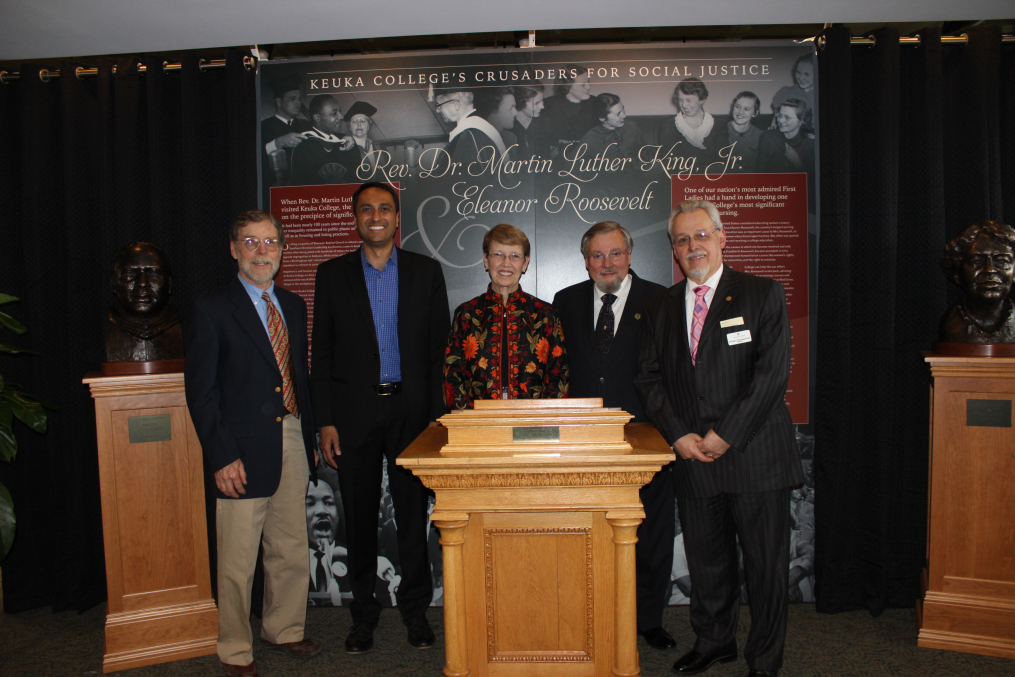 Keuka College Professor Emeritus of Art Dr. Dexter Benedict, left, poses at the May 5, 2017, unveiling of two commemorative busts he created with, from left, Interfaith Youth Core founder and President Eboo Patel, Christine Wertman, Keuka College Trustee Donald Wertman, and Keuka College President Dr. Jorge Díaz-Herrera. The sculptures, of Rev. Dr. Martin Luther King, Jr., far left, and Eleanor Roosevelt, far right, were created by Dexter and commissioned by the Wertmans.