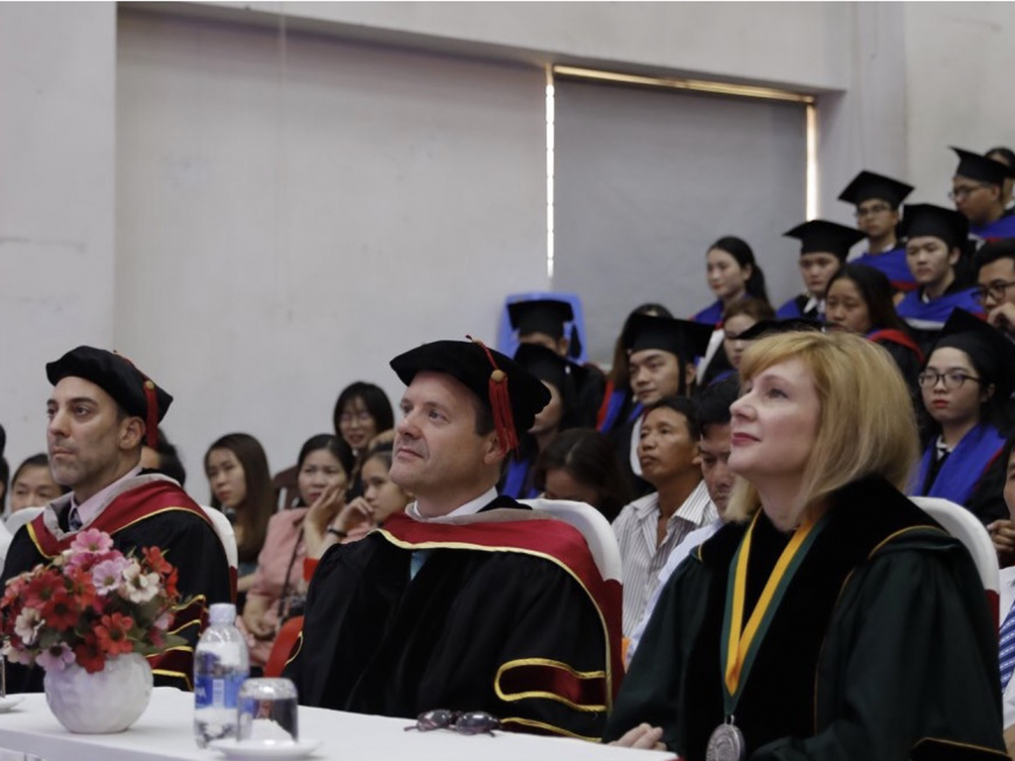 From left, Keuka College Dean of International Programs in Asia Gary Giss, Associate Provost Tim Sellers, and President Amy Storey attend Keuka College graduation ceremonies at Duy Tan University on June 9. 