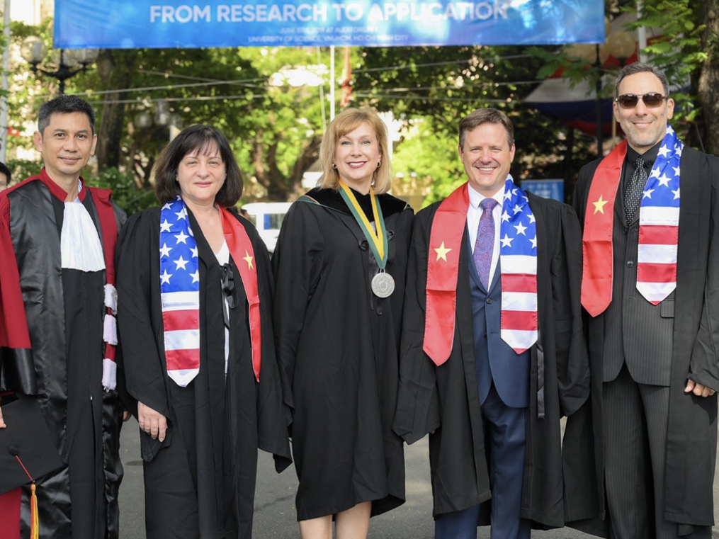 Keuka College President Amy Storey, center, attends graduation ceremonies at the Keuka College Vietnam Program at the University of Science in Ho Chi Minh City. 