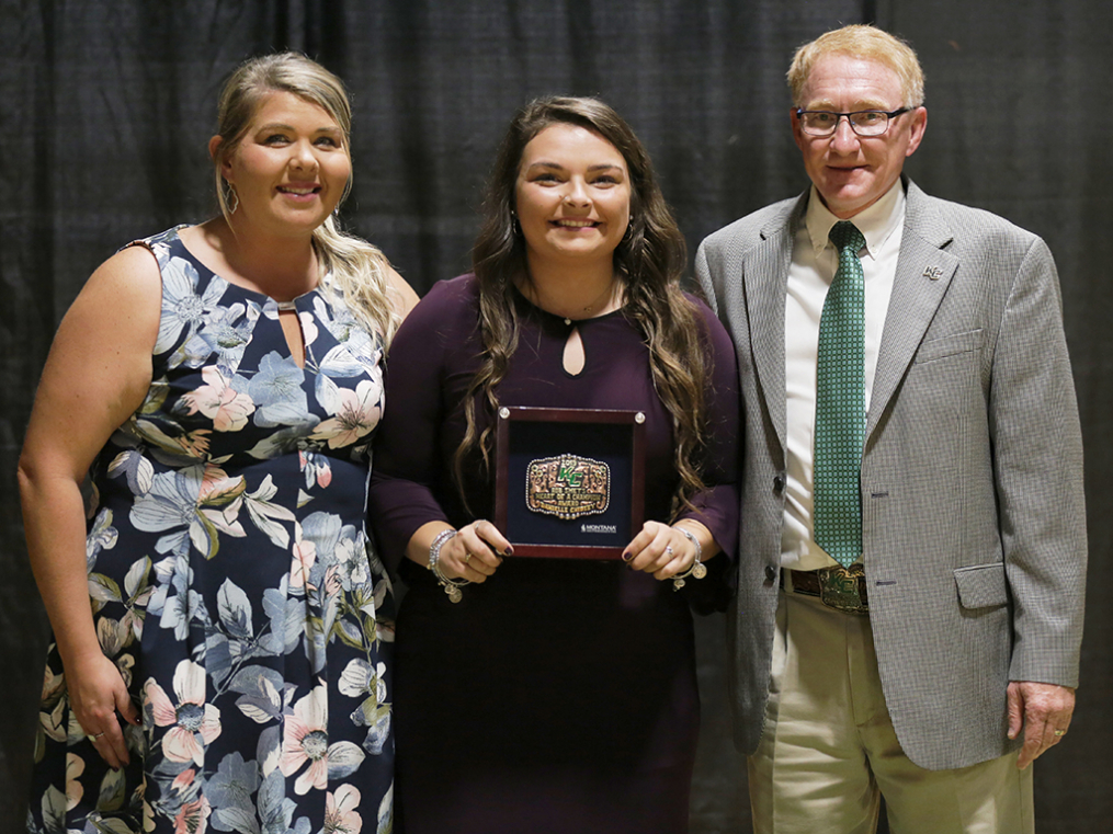 Danielle Chidsey, center, won the Rob Smets Heart of a Champion Award at the Dr. Arthur F. Kirk, Jr. Athletics Hall of Fame Induction & Dinner Friday night.
