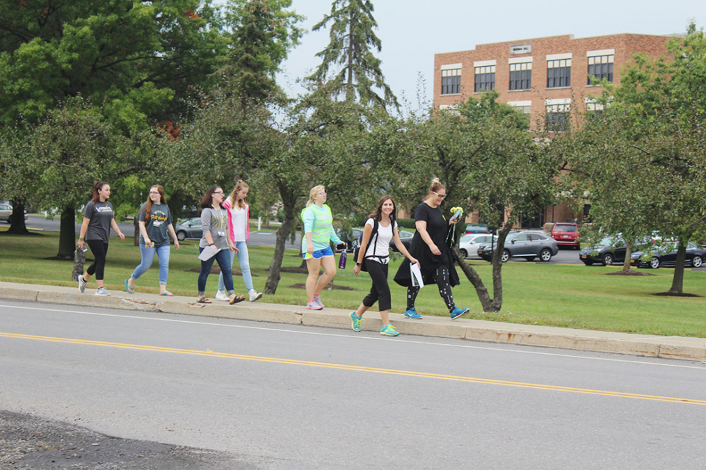 A group of students participates in the 2017 One Walk.